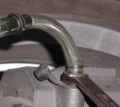 Wrench & hose on bleeder, ready to bleed