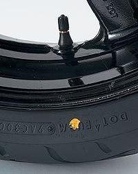 Yellow dot on tire aligned with valve stem