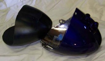 Headlight vibration dampener