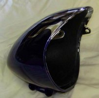 Headlight vibration dampener