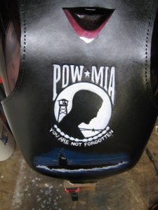 Bib with completed artwork, ready for lacing