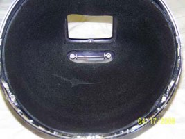 Headlight vibration dampener