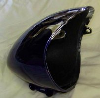 Headlight vibration dampener