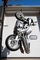 Spiegler brake line holding up a motorcycle