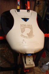 Formed tank bib on a VTX tank