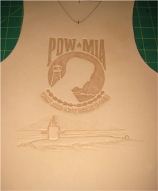Leather bib with design tooling completed