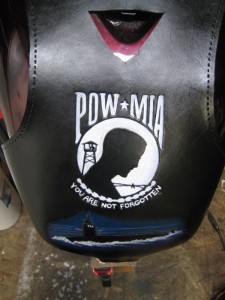 Bib with completed artwork, ready for lacing