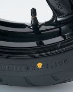 Yellow dot on tire aligned with valve stem