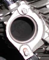 Rear exhaust port with new gasket in place