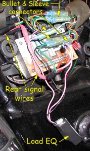 Load equalizer connected under right side cover