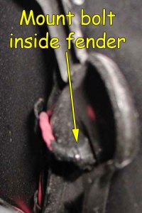 Right mount bolt inside fender