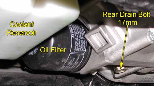 Oil filter and rear drain bolt under the bike