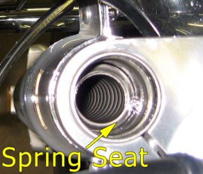 Left fork spring seat