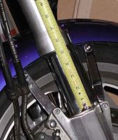 Progressive VTX spring showing 5 inches of fork tube