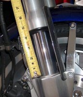 Stock spring showing 4 inches of fork tube